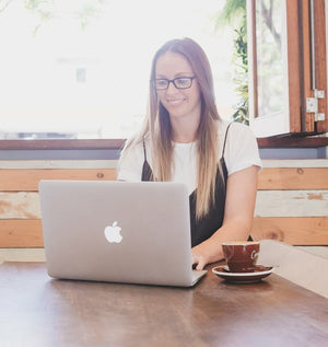 Woman working on laptop BBGPH9OCB9