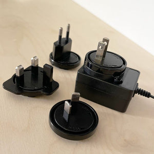 Assorted black power adapter plugs