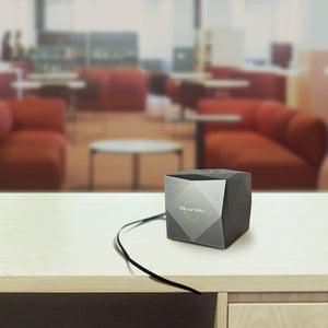 BS3252 speaker on table in modern office setting
