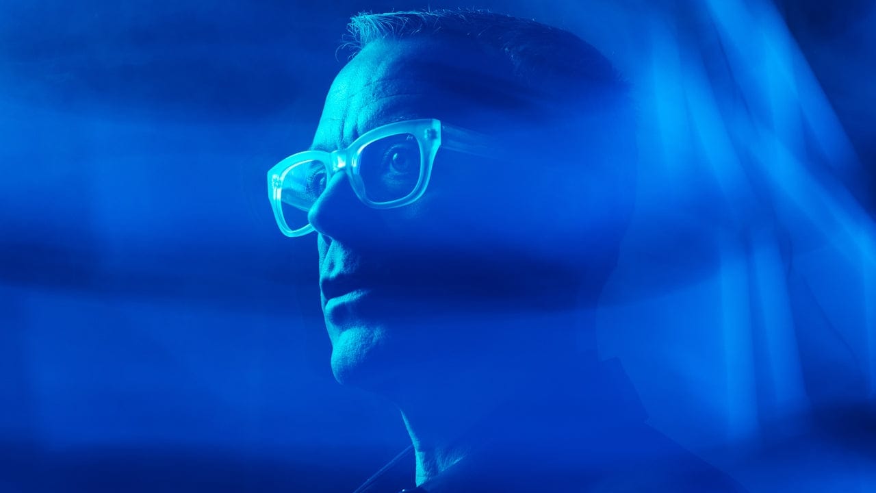 Man in glasses, Nick Fancher photo, blue light