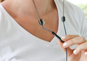 Woman wearing Def3059 necklace, closeup view.