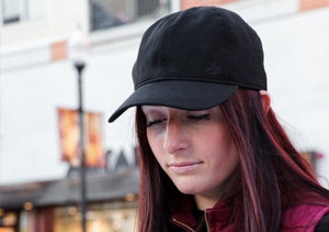 Woman wearing black cap, Def8670