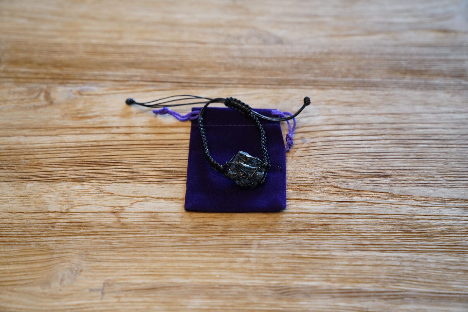 ES Shungite bracelet on purple pouch