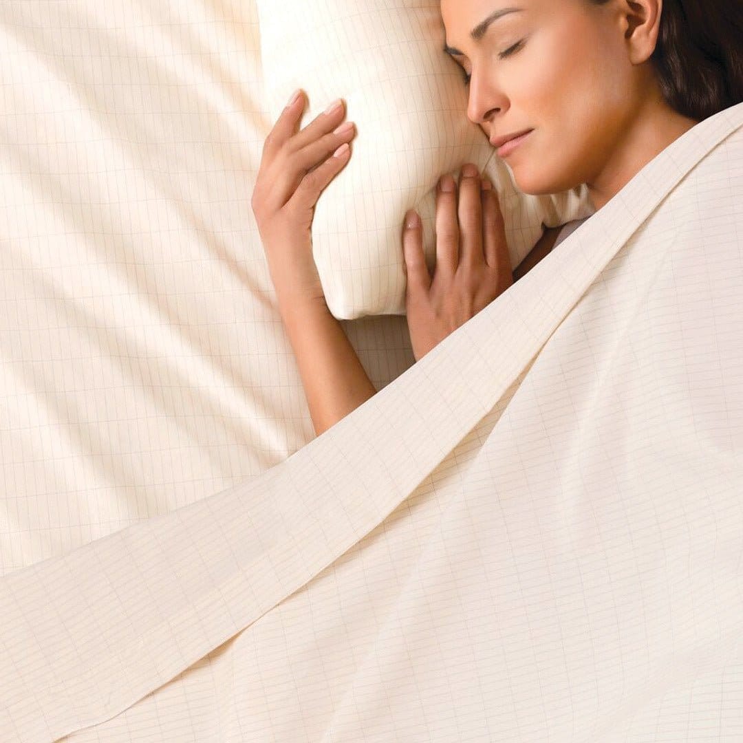 Woman sleeping peacefully in bed