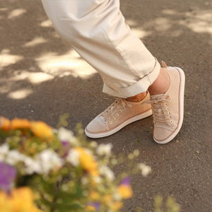 Beige sneakers on person, H-CVW_57ef931b