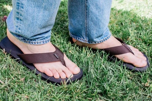 Men's brown earthing sandals on grass