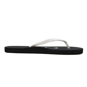 Black and white grounding flip-flop sandal, side profile view