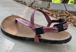 Sand colored sandal with pink straps.