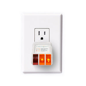 Outlet tester plugged into electrical outlet