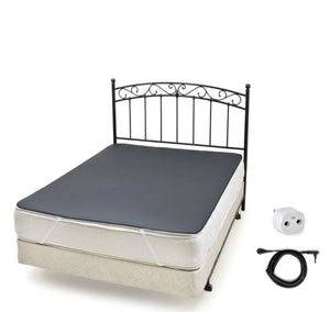 Bed with heated mattress pad and control unit