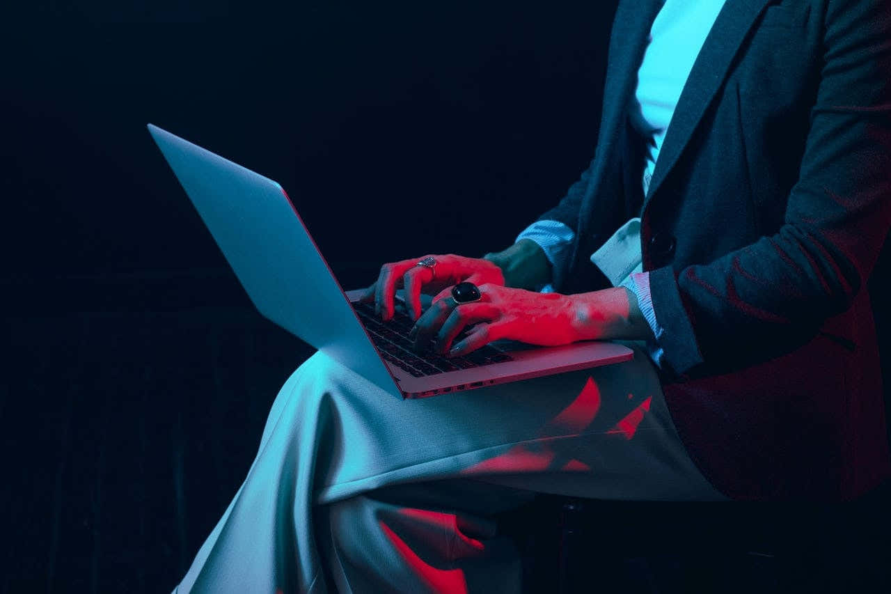 Person using laptop, optimizing backup product, Nick Fancher photo