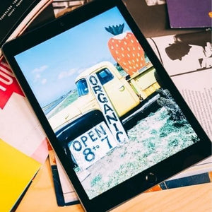 iPad displaying organic produce truck image