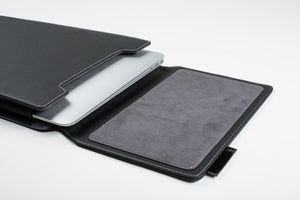Black laptop sleeve with laptop inside