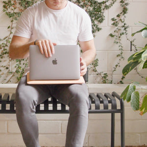 Man with laptop on bench - WP10392