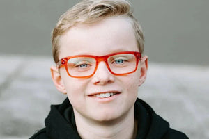 Bailey wearing red crystal glasses