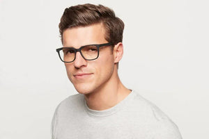 Man wearing Carter matte black glasses.
