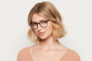Woman wearing Clark Matte Havana eyeglasses