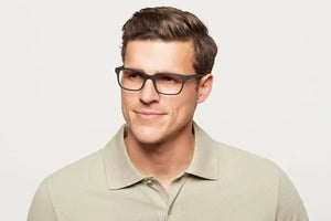 Man wearing crane matte black glasses