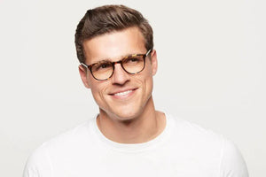 Man wearing Lane Maple Tortoise eyeglasses