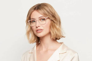 Woman wearing Lily blush pink glasses