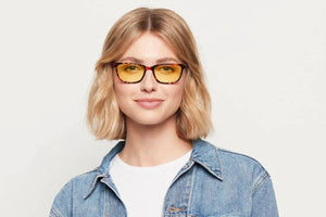 Woman wearing Wells classic tortoise eyeglasses