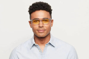 Man wearing Wells Crystal glasses